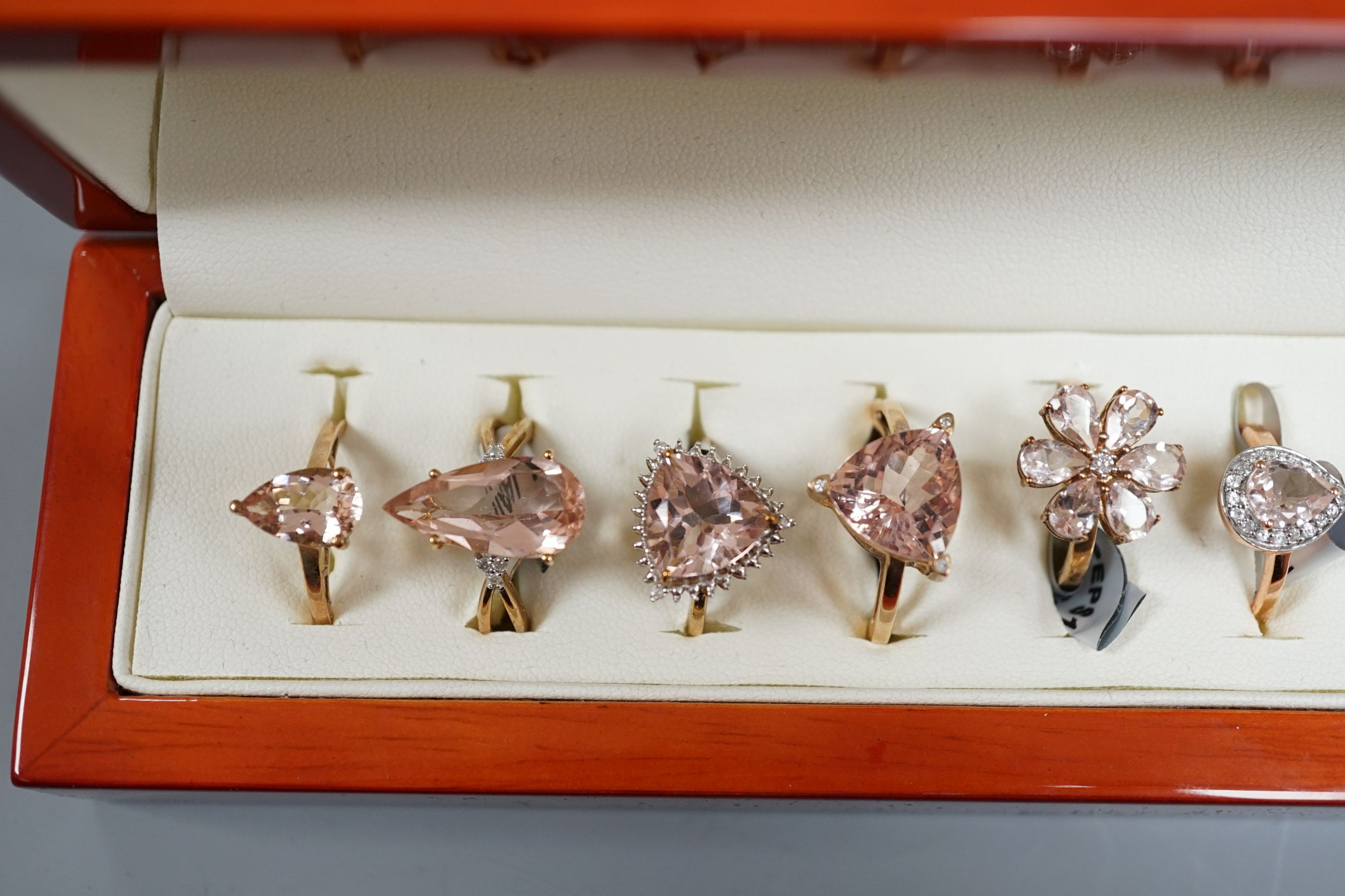 Eight assorted modern 9ct gold and morganite set dress rings and a 925 and gem set ring